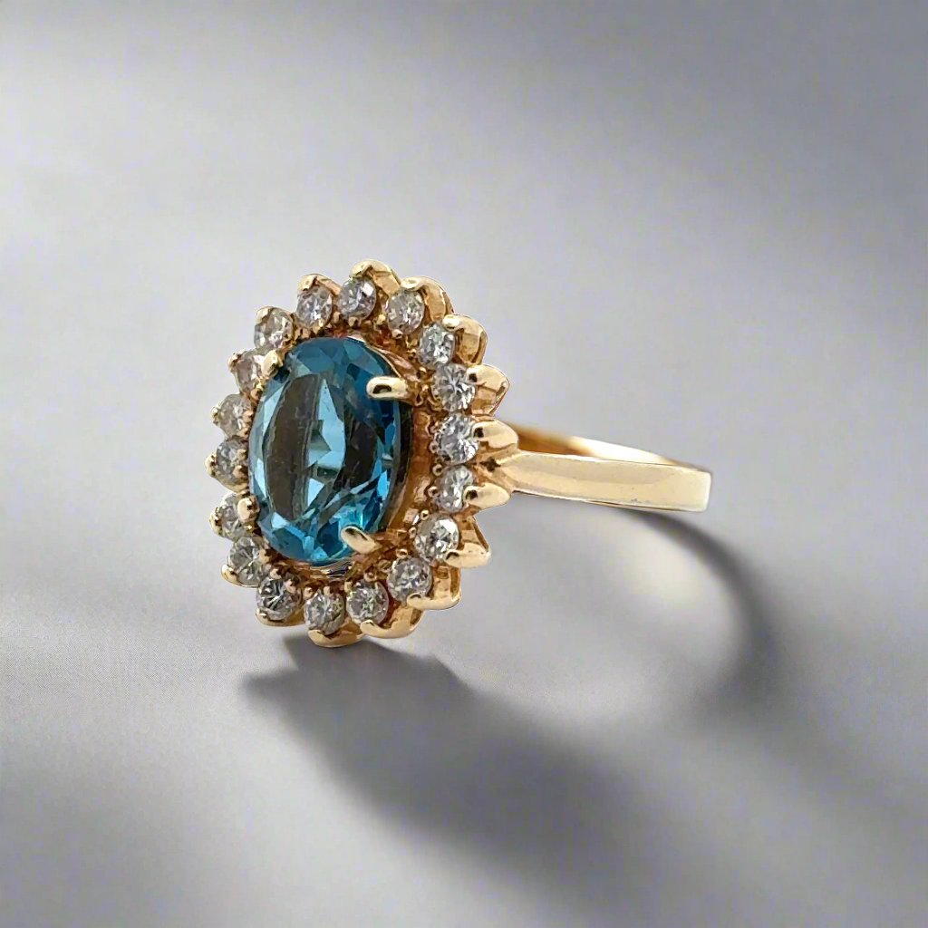 Oval Blue Topaz, Diamond and 14K Yellow Gold Ring